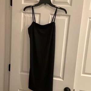 Your new little black dress with a twist by City Triangles